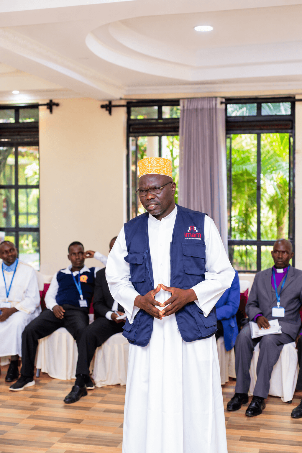 Faith leader speaking during an IFAGE community dialogue